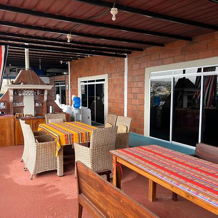 פוארטו בקריסו מורנו Hostal Cattleya מראה חיצוני תמונה