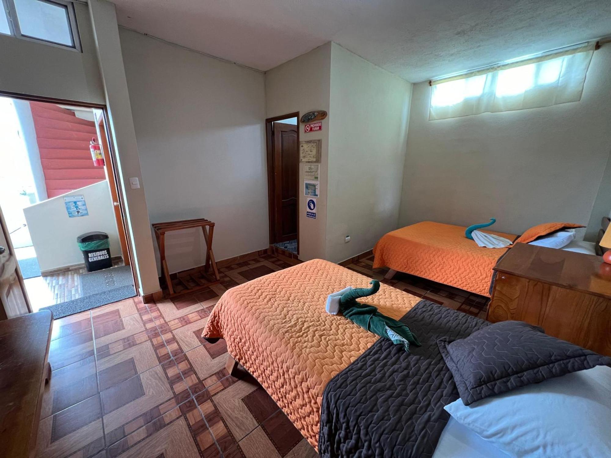 פוארטו בקריסו מורנו Hostal Cattleya מראה חיצוני תמונה